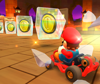 Thumbnail of the Baby Luigi Cup challenge from the November–December 2022 Peach vs. Bowser Tour; a Break Item Boxes challenge set on GBA Bowser's Castle 3