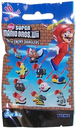 A blind bag for a set of New Super Mario Bros. Wii-themed figures by Tomy, featuring a Boo, a Red Koopa Troopa, a Dry Bones, a Bob-omb, a Paragoomba, a Fuzzy, a Scaredy Rat, a Para-Beetle, a Cooligan, and a Mechakoopa.